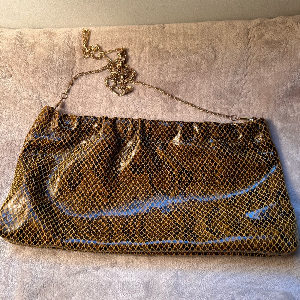 Whiting and Davis Snake skin genuine American leather clutch/crossbody
